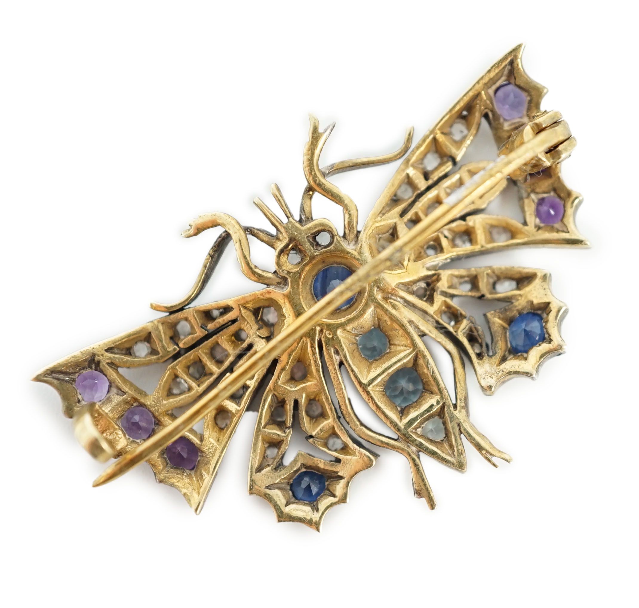 A Victorian gold and silver, diamond, amethyst, sapphire and aquamarine? set butterfly brooch